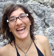 adri laughing by the sea